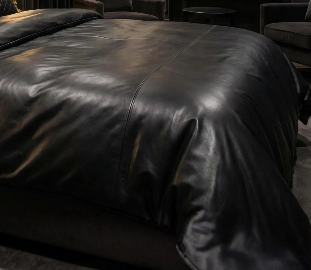 black leather bed sheet set with quilted covers, side angle view
