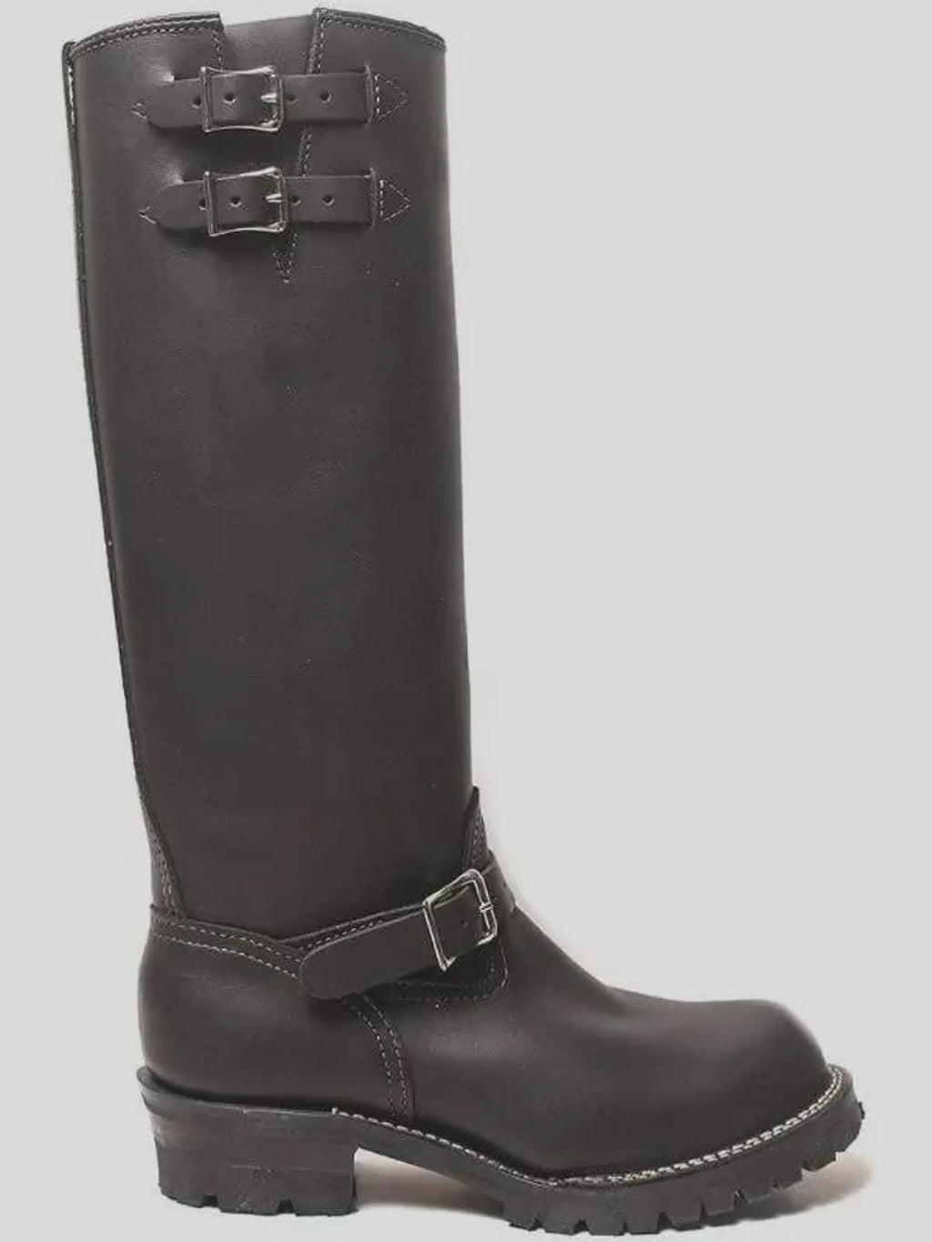 Black Double strap knee-high boot with buckles on a gray background