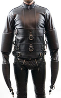 Black leather harness with intricate detailing on a white background
